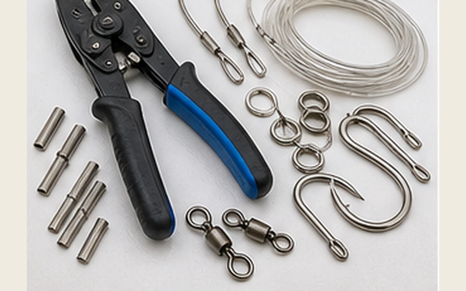 Offshore rigging terminal kit with crimping pliers, crimps, swivels, rings, hooks, and heavy leader
