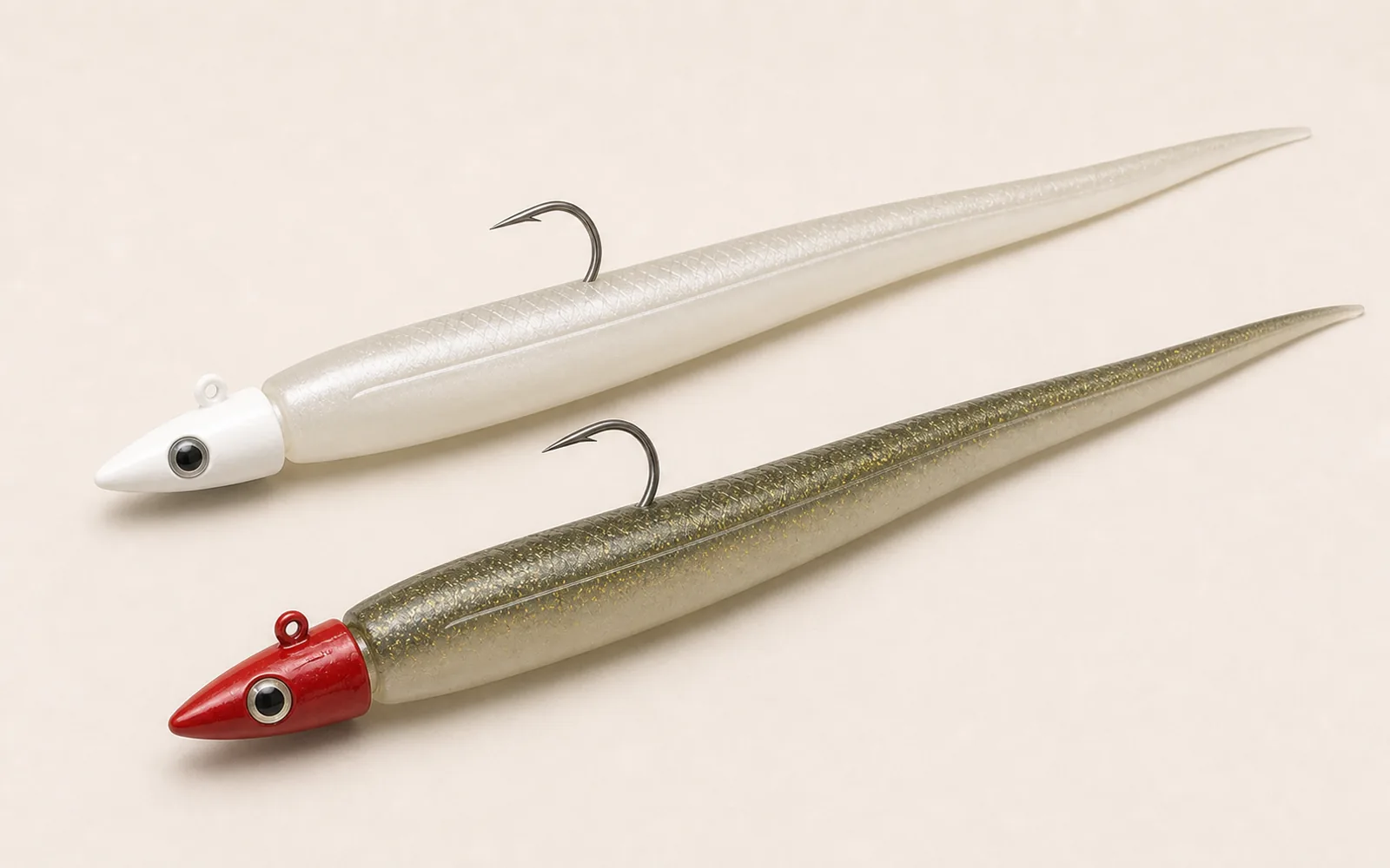 Large rigged offshore soft baits with weighted jigheads, single hooks, and slim paddle tails